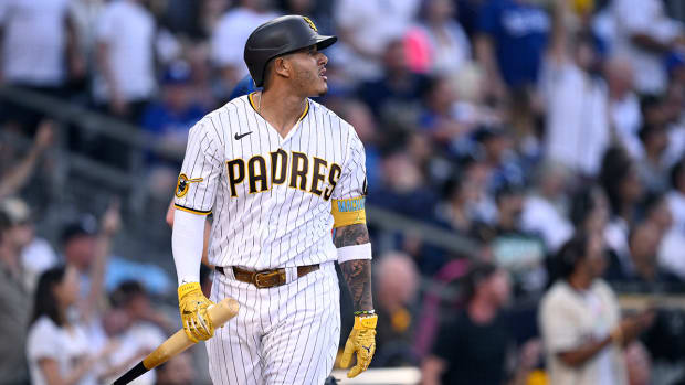 Padres third baseman Manny Machado (13) watches after hitting a home run against the Dodgers during the fourth inning at Petco Park.